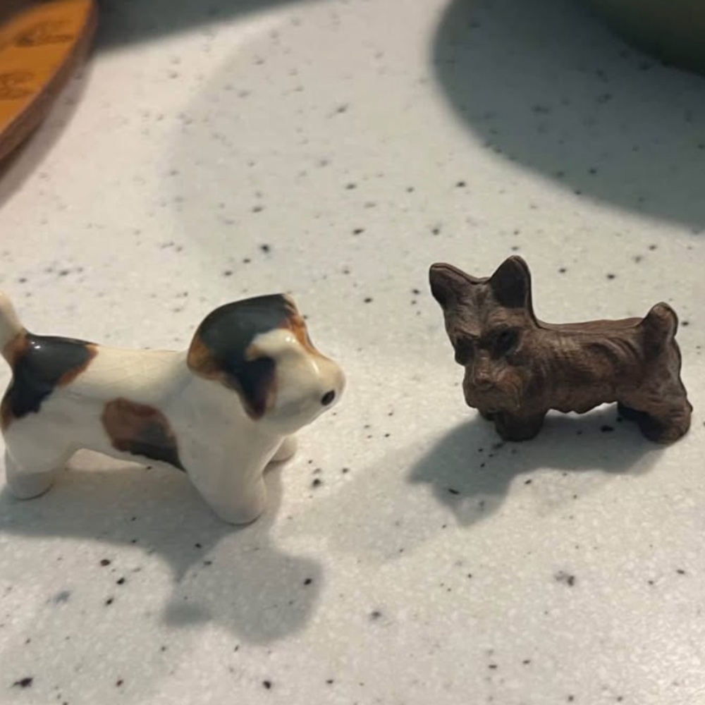 Two dog figurines